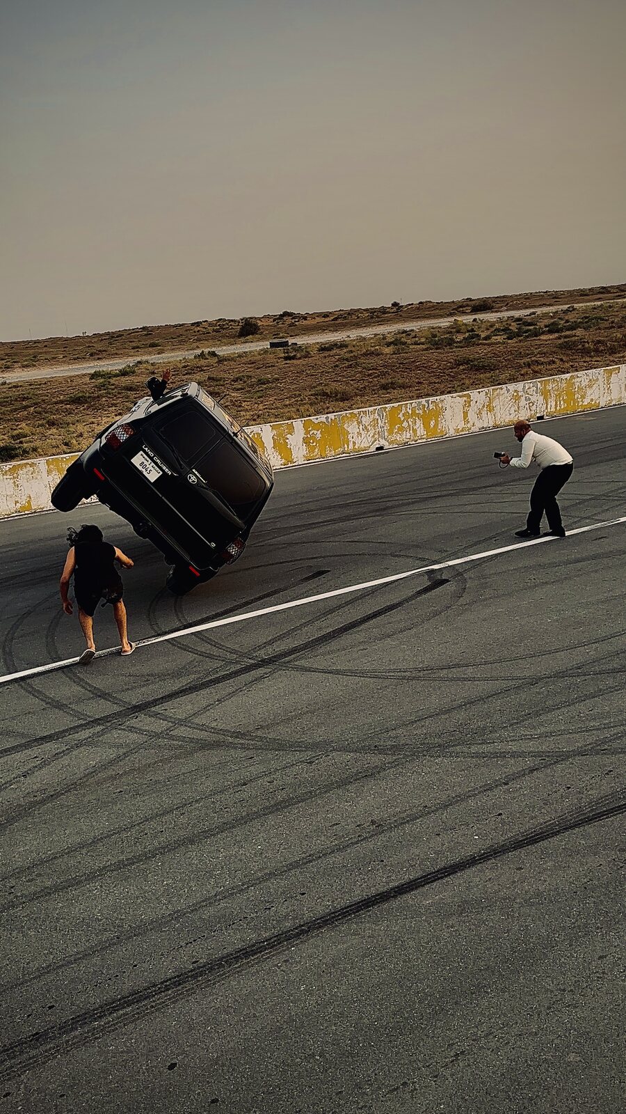 Crew on set · closed venue — SideWheelPro production work at Emirates Motorplex, UAE